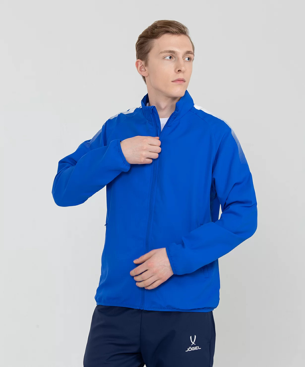 Реальное фото Костюм спортивный CAMP Lined Suit, синий/темно-синий/белый от магазина СпортСЕ